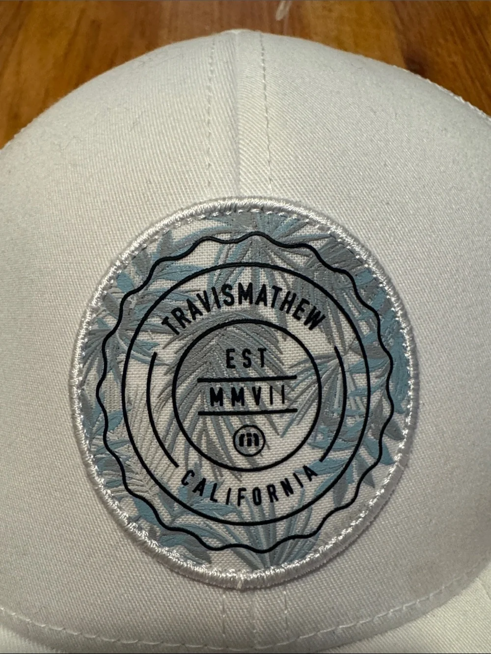 Travis Mathew Men’s white Patch Trucker Hat